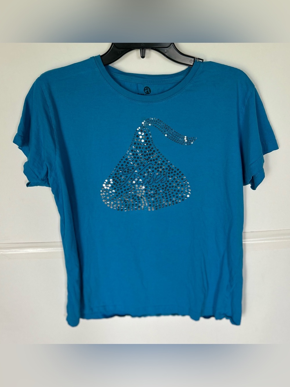 Artisans woman’s XL Teal Rhinestone Hershey Kiss Graphic Tee.